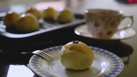 Egg Yolk Pastries Served with Hot Tea for Mid Autumn Festival Stock Footage 345669443