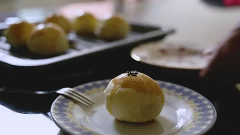 Egg Yolk Pastries Served with Hot Tea for Mid Autumn Festival Stock Footage 345669459