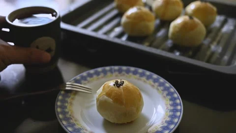 Egg Yolk Pastries Served with Hot Tea for Mid Autumn Festival Stock Footage 345669558