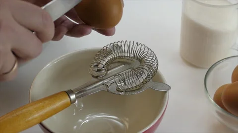 Egg yolk separator, slow motion, 4k Stock Footage 63297945