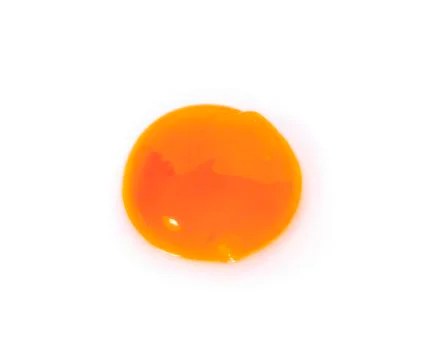 Egg yolk on white background Stock Photos