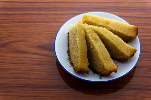 Eggless rava cake in a plate Stock Photos