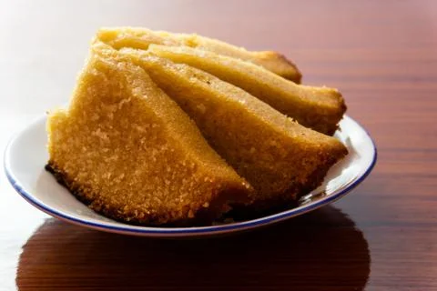 Eggless rava cake in a plate Stock Photos