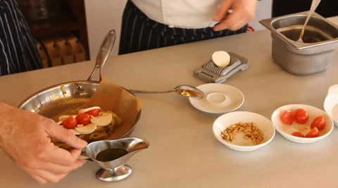 Eggplant dish pine nuts cherry tomato Video stock 38023096