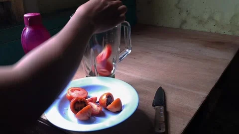 Eggplant juice mixed with tomatoes Stock Footage 243475074