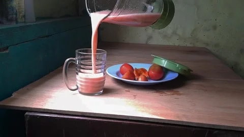 Eggplant juice mixed with tomatoes Stock Footage 243475163