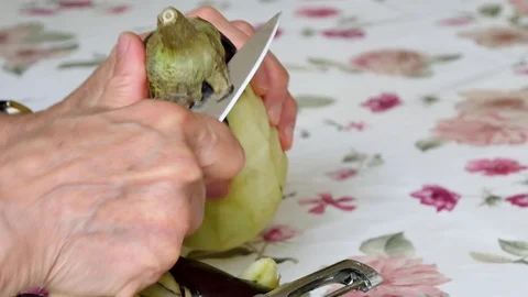An eggplant is peeled in a kitchen. Stock Footage 94963279
