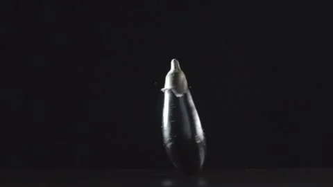 Eggplant rotating on a black background Stock Footage 146947798