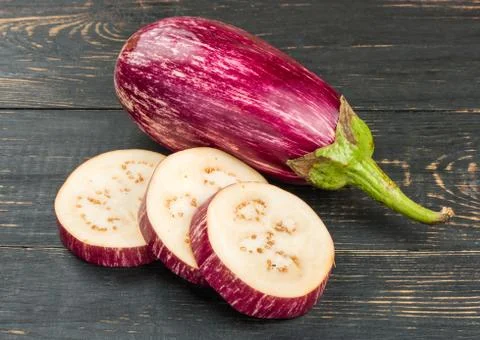 Eggplant with slices Stock Photos