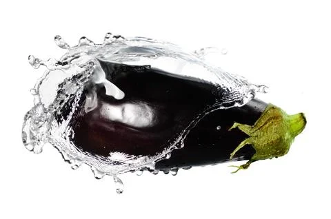 Eggplant splash Stock Photos
