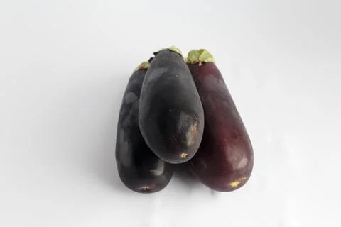 Eggplant on white background - perspective view. Stock Photos