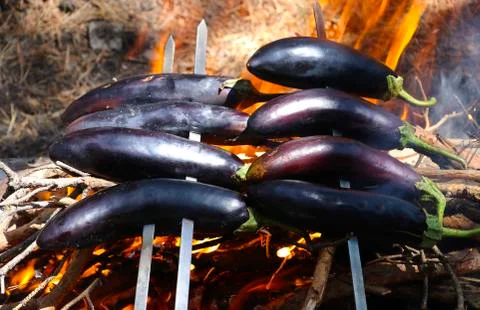 Eggplants are fried at the stake Stock Photos