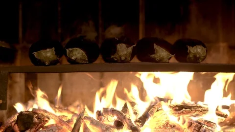 Eggplants on the grillplate Stock Footage 85938097