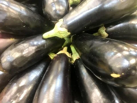 Eggplants on a plate Stockfoto's