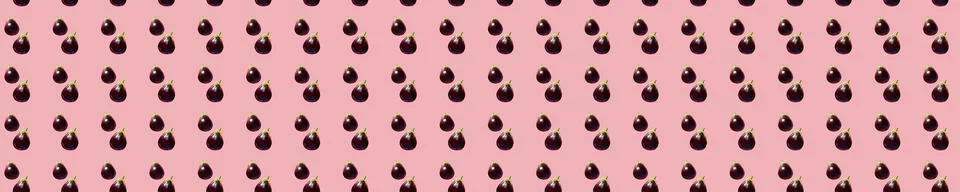 Eggplants Seamless Pattern on a pink background. Many Aubergines. Table top Stock Photos