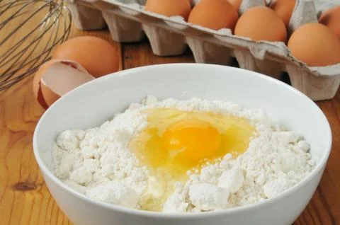Eggs and baking mix Stock Photos
