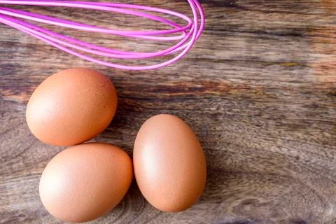 Eggs and beater Fotos Stock