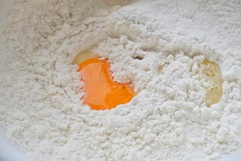 Eggs and flour Stock Photos
