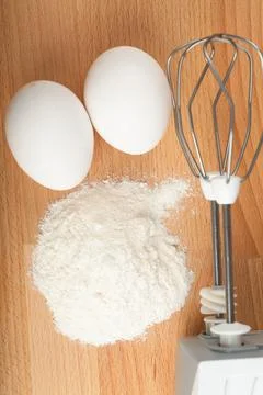 Eggs and flour Stock Photos