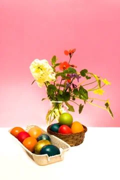 Eggs and flowers Stock Photos