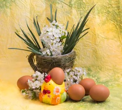 Eggs and spring flowers Stock Photos
