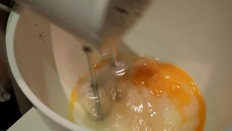 Eggs and Sugar in Motion: Whisking Ingredients for Homemade Baking Fun Stock Footage 328698239