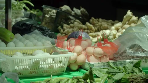 Eggs and various material vegetables in the vegetable market Stock Footage 148053638