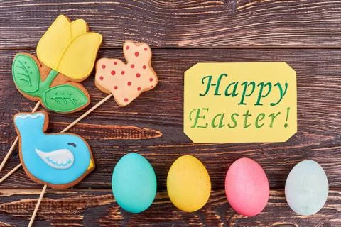 Eggs and yellow Easter card. Stock Photos