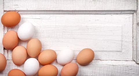 Eggs on a antique panel Stock Photos