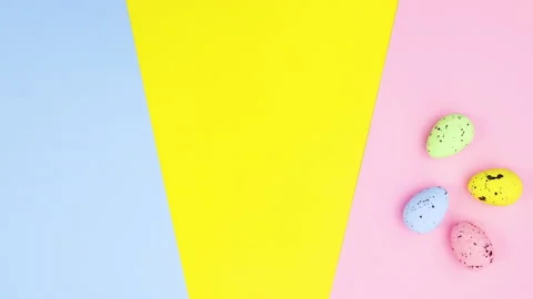 Eggs appear on right side and on left come two eggs with legs. Stop motion Stock Footage 149250929