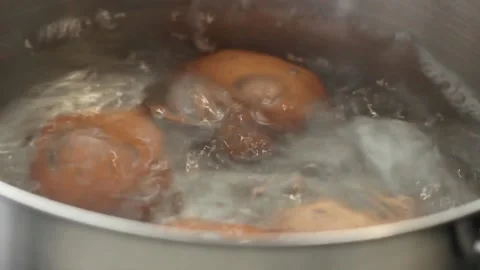 Eggs are boiled in a saucepan Stock Footage 234212914