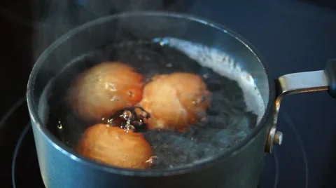 Eggs are boiling in pot close Stock Footage 67829279