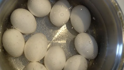 Eggs are cooked in a pan close up, top view Video stock 88333097