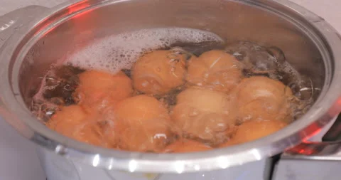 Eggs are cooked in a saucepan Video stock 145932556