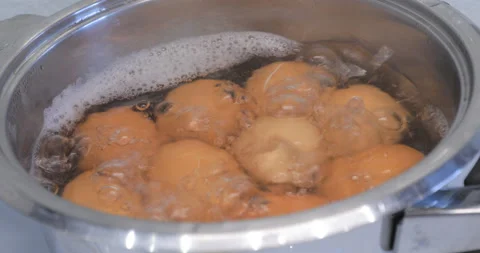 Eggs are cooked in a saucepan 스톡 동영상 145956084