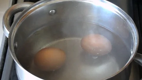 Eggs are cooked in a saucepan not a gas stove Stock Footage 104360728