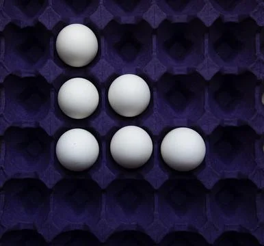 Eggs arranged in geometric patterns Foto stock