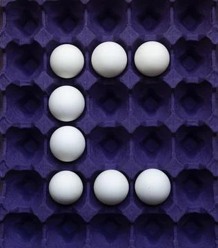 Eggs arranged in geometric patterns 스톡 사진