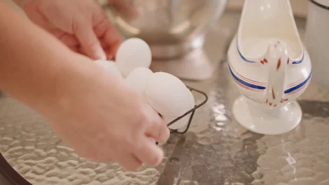 Eggs baking prep. Preparing morning baking with eggs. Arranging eggs on glass Stock Footage 346393959