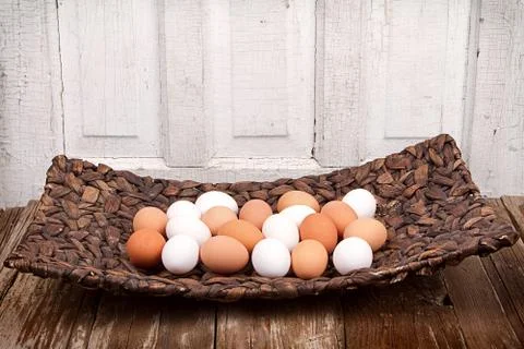 Eggs in a basket Stock Photos