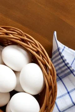 Eggs in a basket Stock Photos
