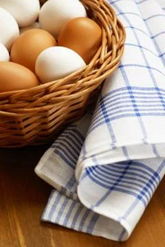 Eggs in a basket Stock Photos