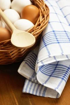 Eggs in a basket Stock Photos