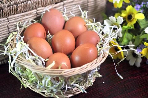 Eggs in  basket Stock Photos