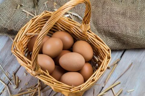 Eggs in a basket Stock Photos