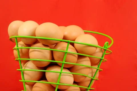 Eggs in a basket Stock Photos