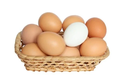 Eggs in a basket Stock Photos