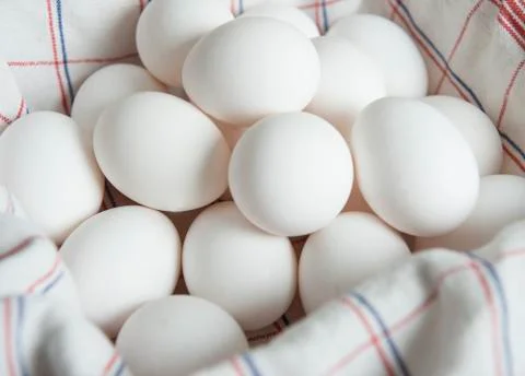 Eggs in a basket Stock Photos