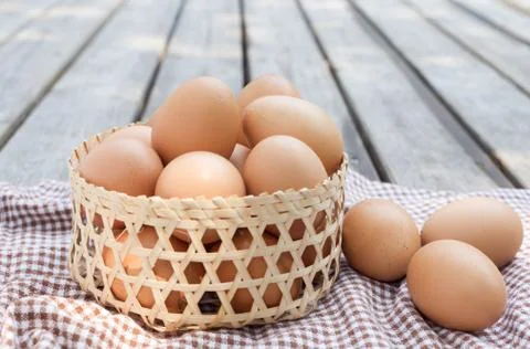 Eggs in the basket Stock Photos