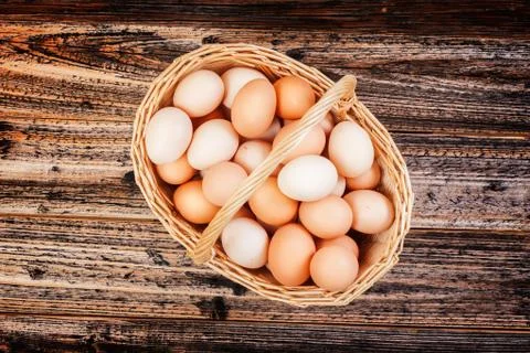 Eggs in a basket Stock Photos